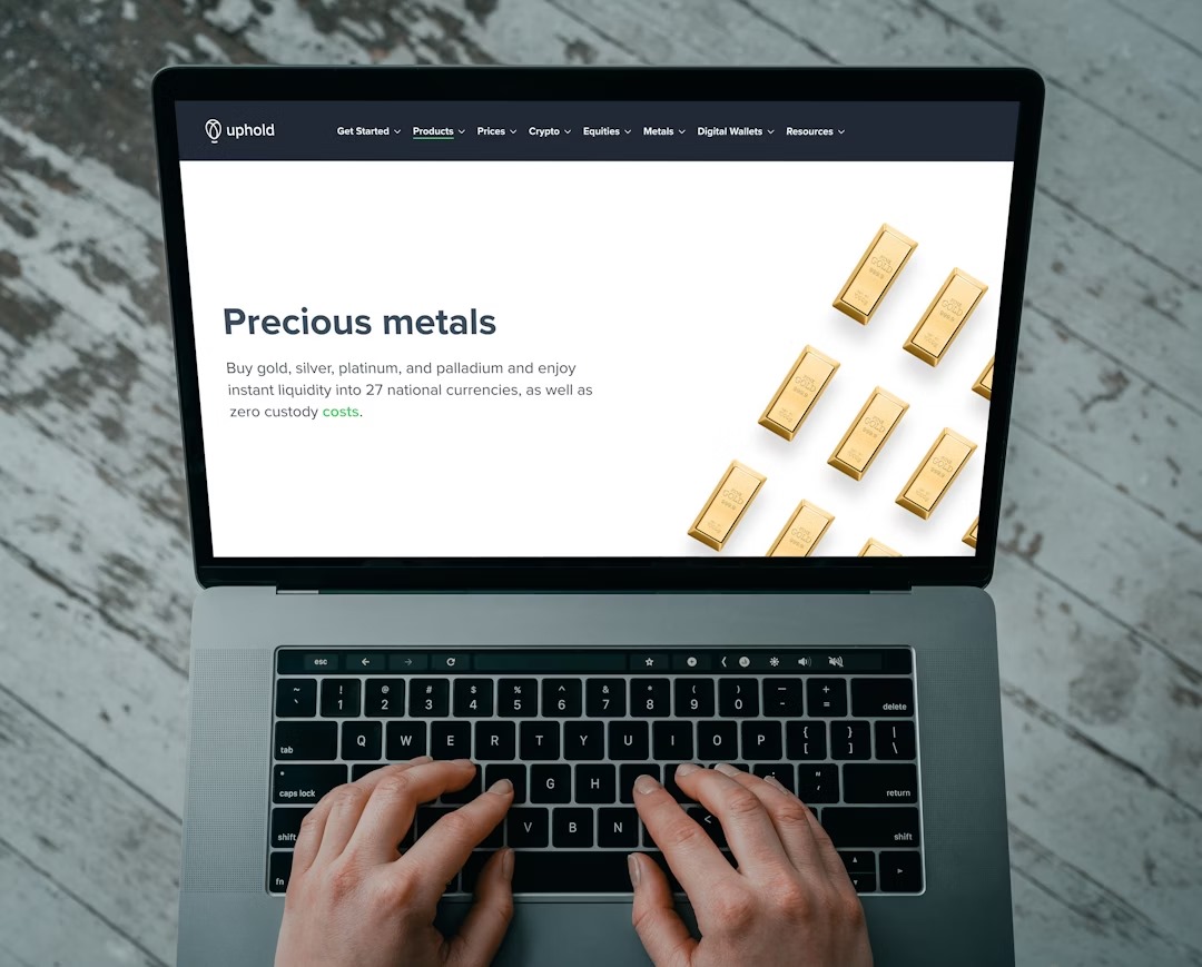Laptop and Gold Bars